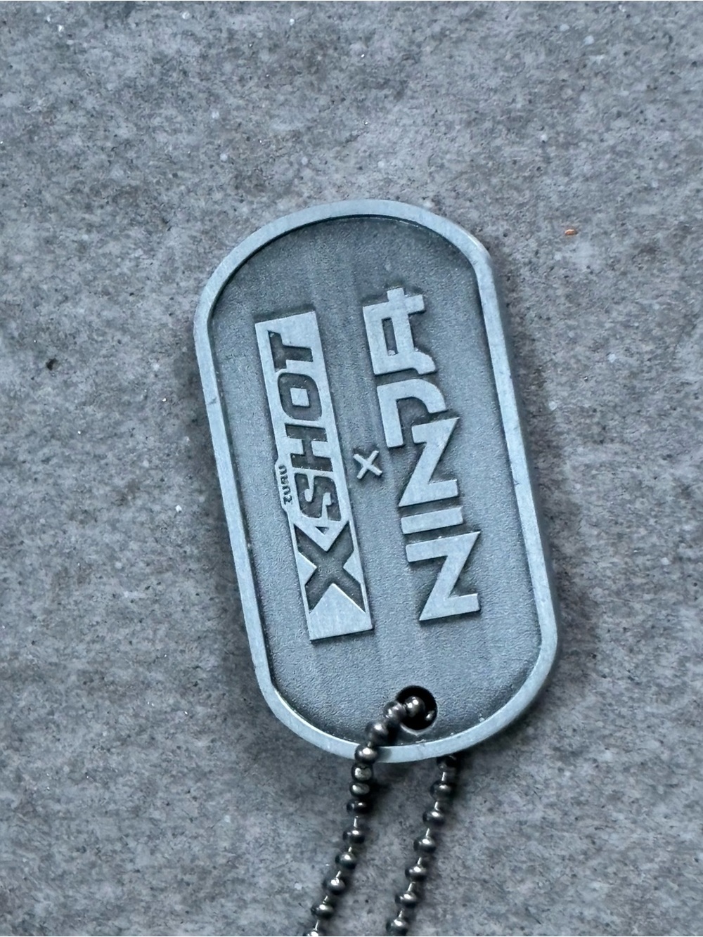 XShot x Ninja Silvertone Dog Tag Necklace Accessory